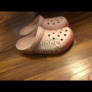 Pink and grey crocs